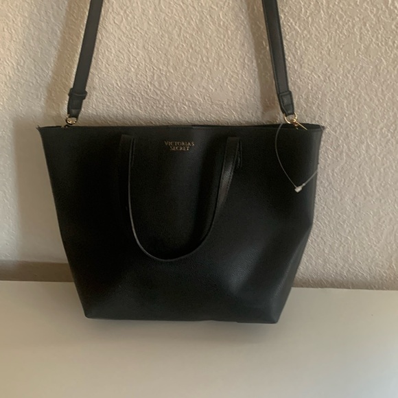 Victoria's Secret Handbags - Victoria's Secret Black Trapezoidal Tote.used in good condition.